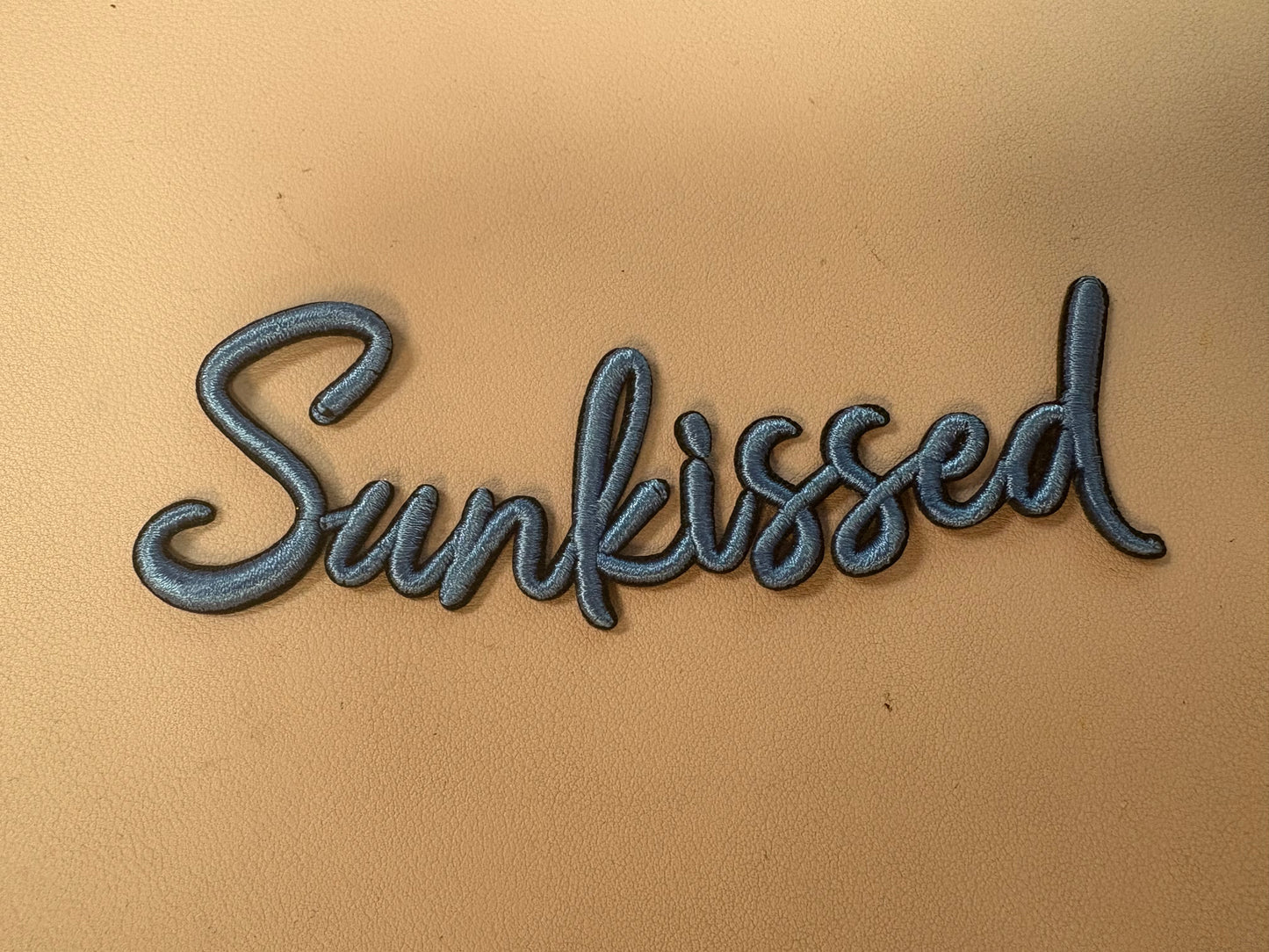 “Sunkissed” cursive script hat patch